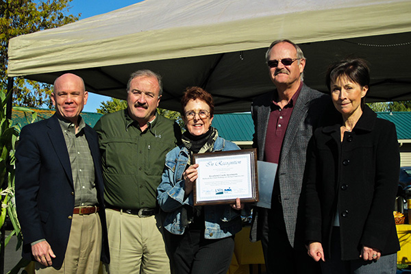 Founders, Dianne, Greg, and Gary receiving a USDA Rural Development award.